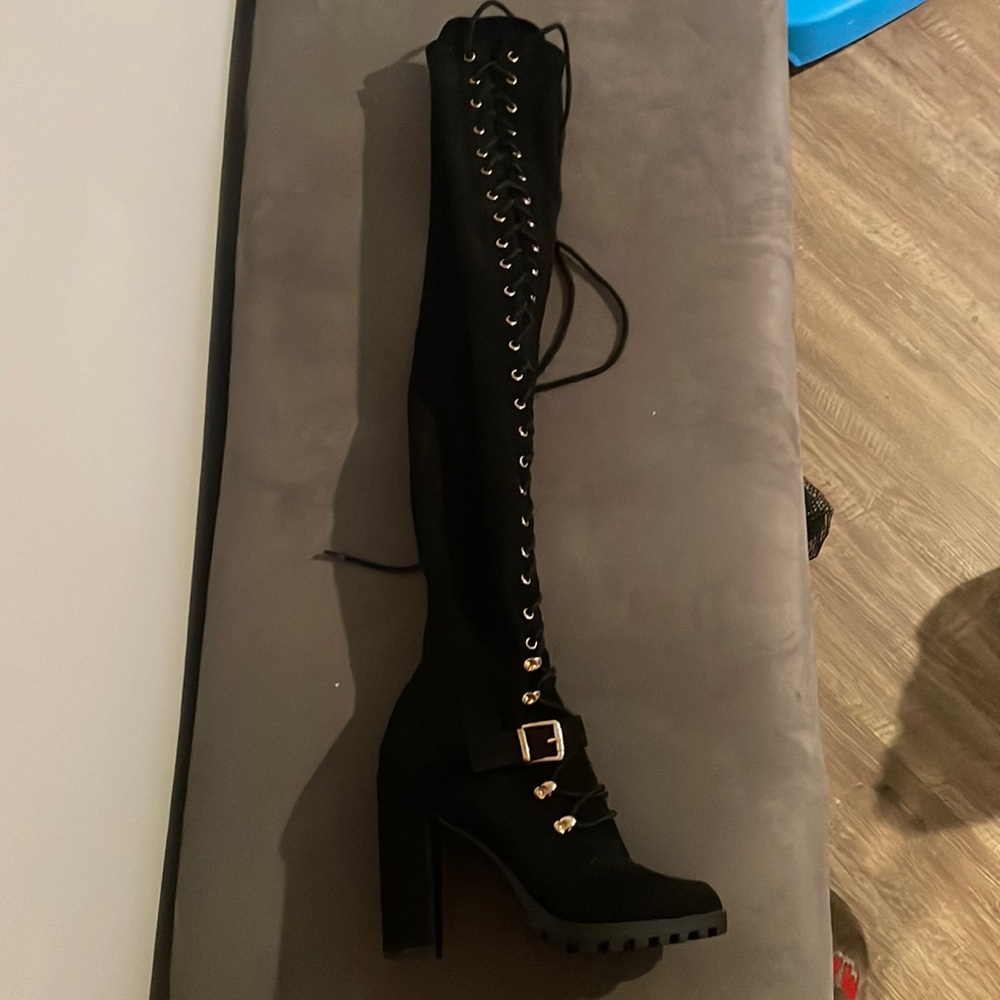 Black above the knee boots